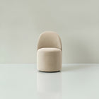 Antonia velvet swivel chair with rounded backrest