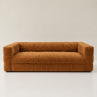 Portofino low channel-tufted sofa in rust-toned ribbed corduroy