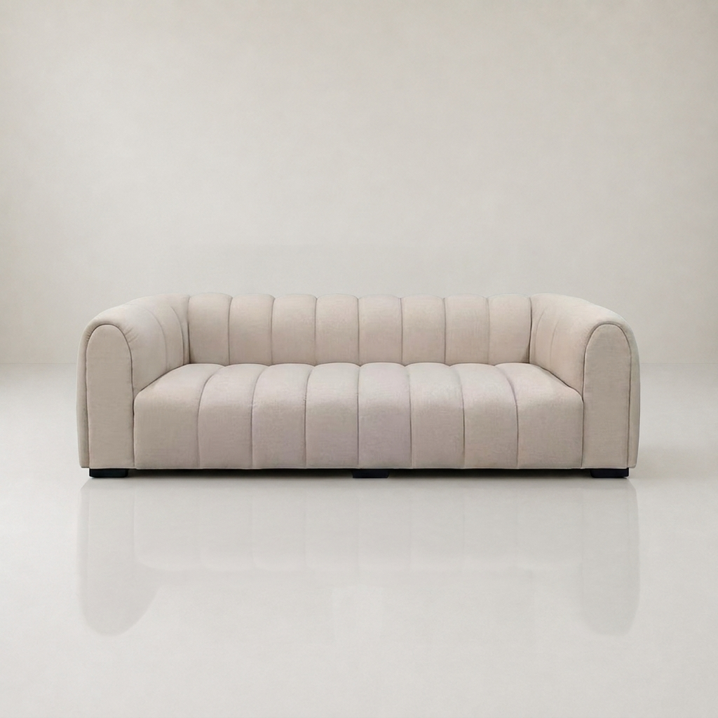 Bianca curved sofa in mushroom boucle with channel tufting