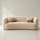 Beatrice curved sofa in camel velvet
