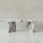 Castello dining table in Calacatta Viola marble with fluted centre support